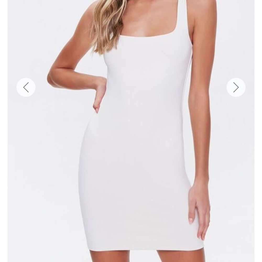 Cream colored ribbed tank dress.